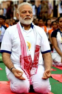 "The image shows Indian Prime Minister Shri Narendra Modi performing yoga."