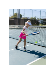  A 10-year-old girl practicing tennis, inspired by the Wimbledon Schedule 2024.      20240712_082910_0000